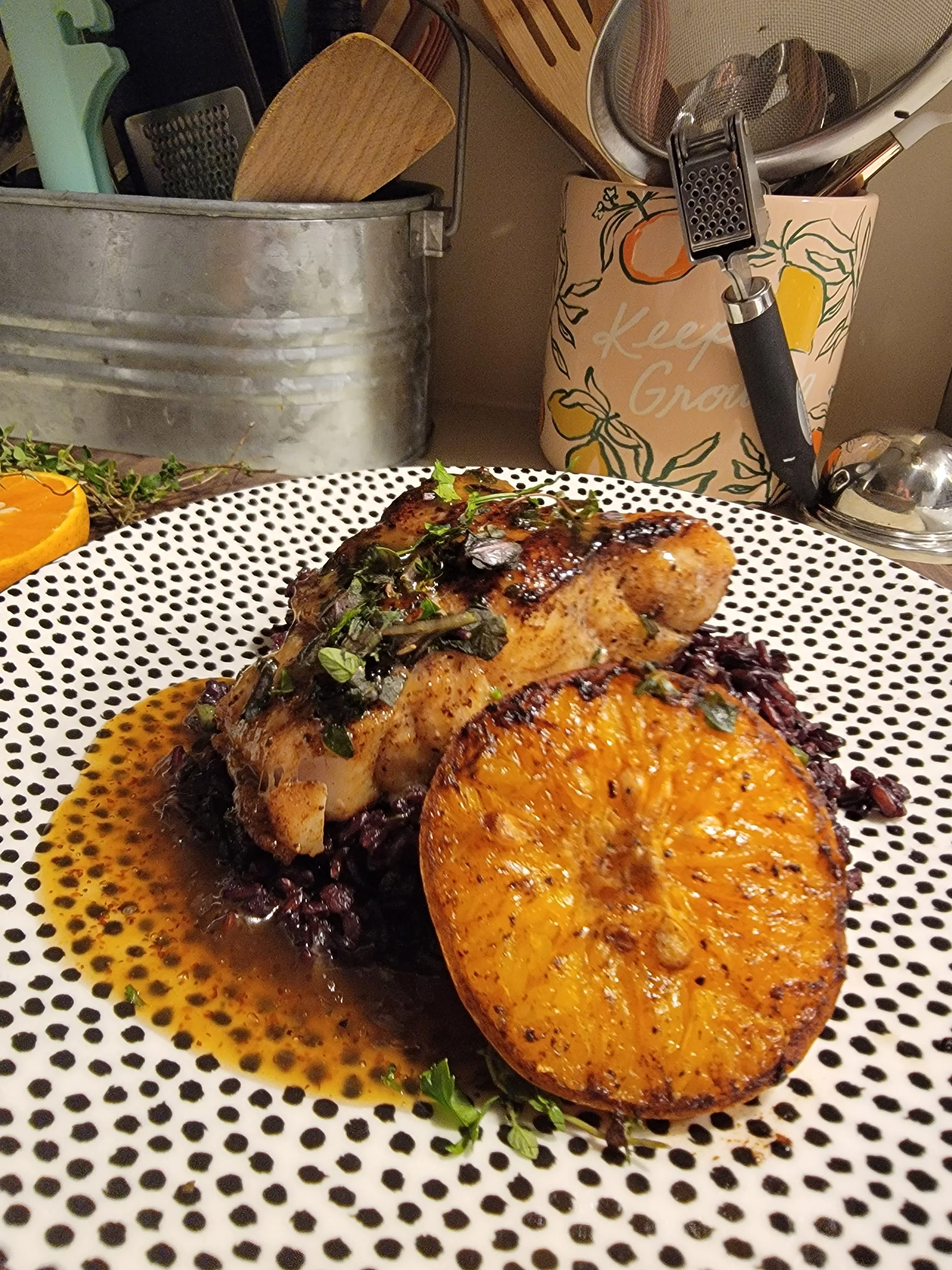 Pan seared tile fish with a miso-honey tangerine glaze served with lemongrass infused black japonica rice