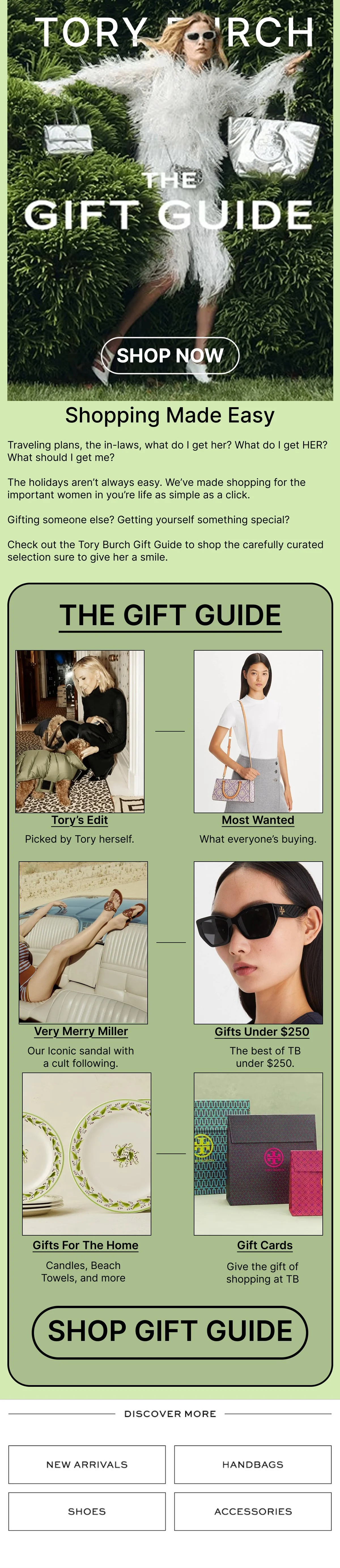 A woman in sunglasses and a white, fluffy coat with fur accents standing among green bushes, holding silver gift bags, promoting Tory Burch's gift guide with the headline 'The Gift Guide' and a 'Shop Now' button.