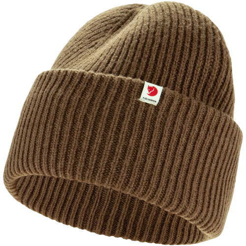 A brown knit beanie hat with a small tag featuring a red logo.