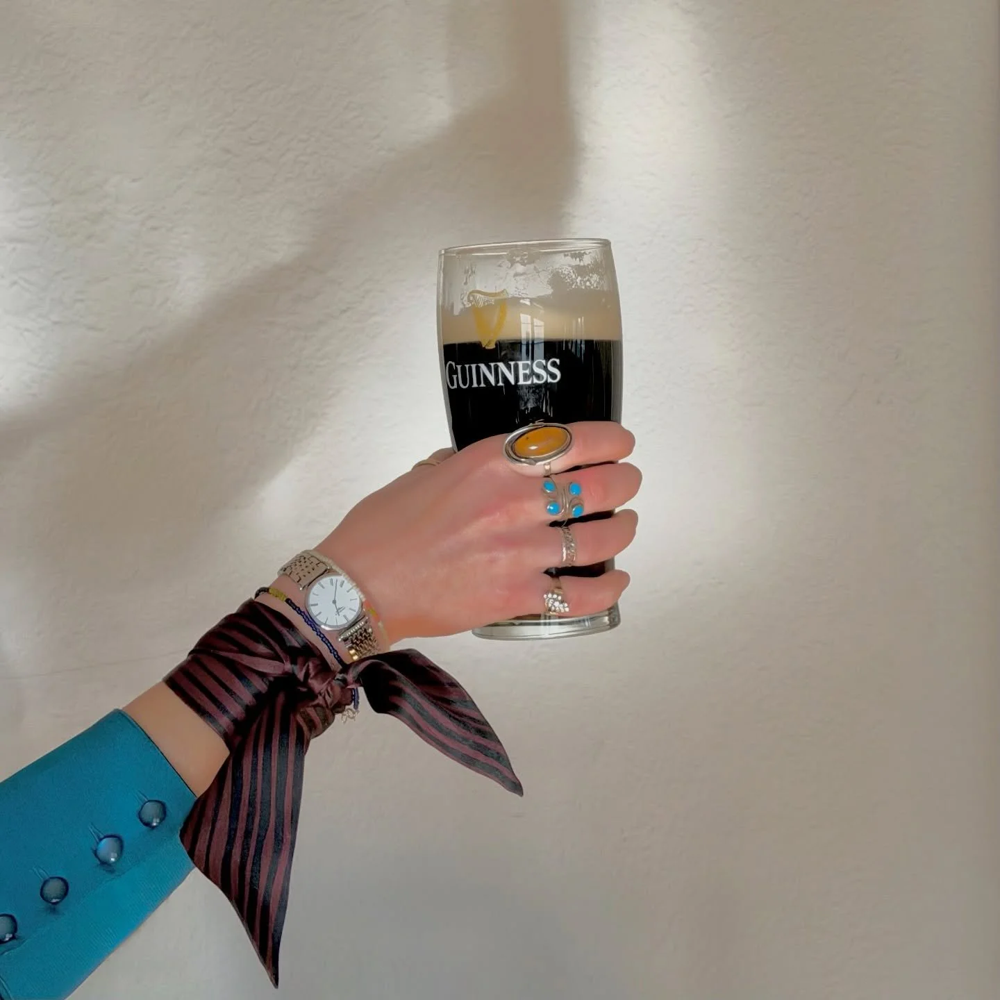 The Noir Silk Ribbon Scarf has entered the chat. Silk at the wrist. Guinness in hand. Life&rsquo;s all about balance, baby! 

#Psychomilf #eclecticstyle #womenowned #dailyrituals