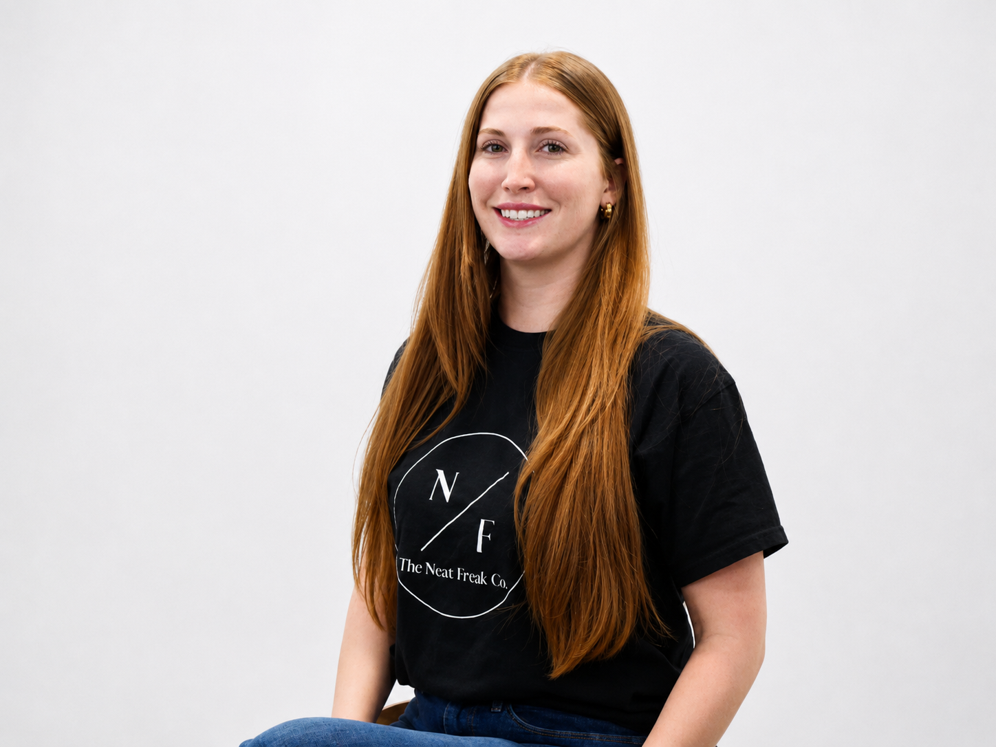 Headshot of The Neat Freak Co. operations manager Caroline with a white background.