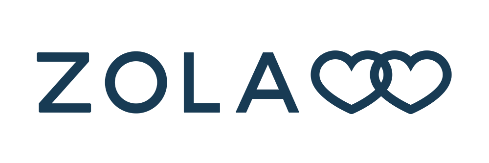 The word "ZOLA" in black capital letters with two intertwined blue hearts replacing the letter "O"s.