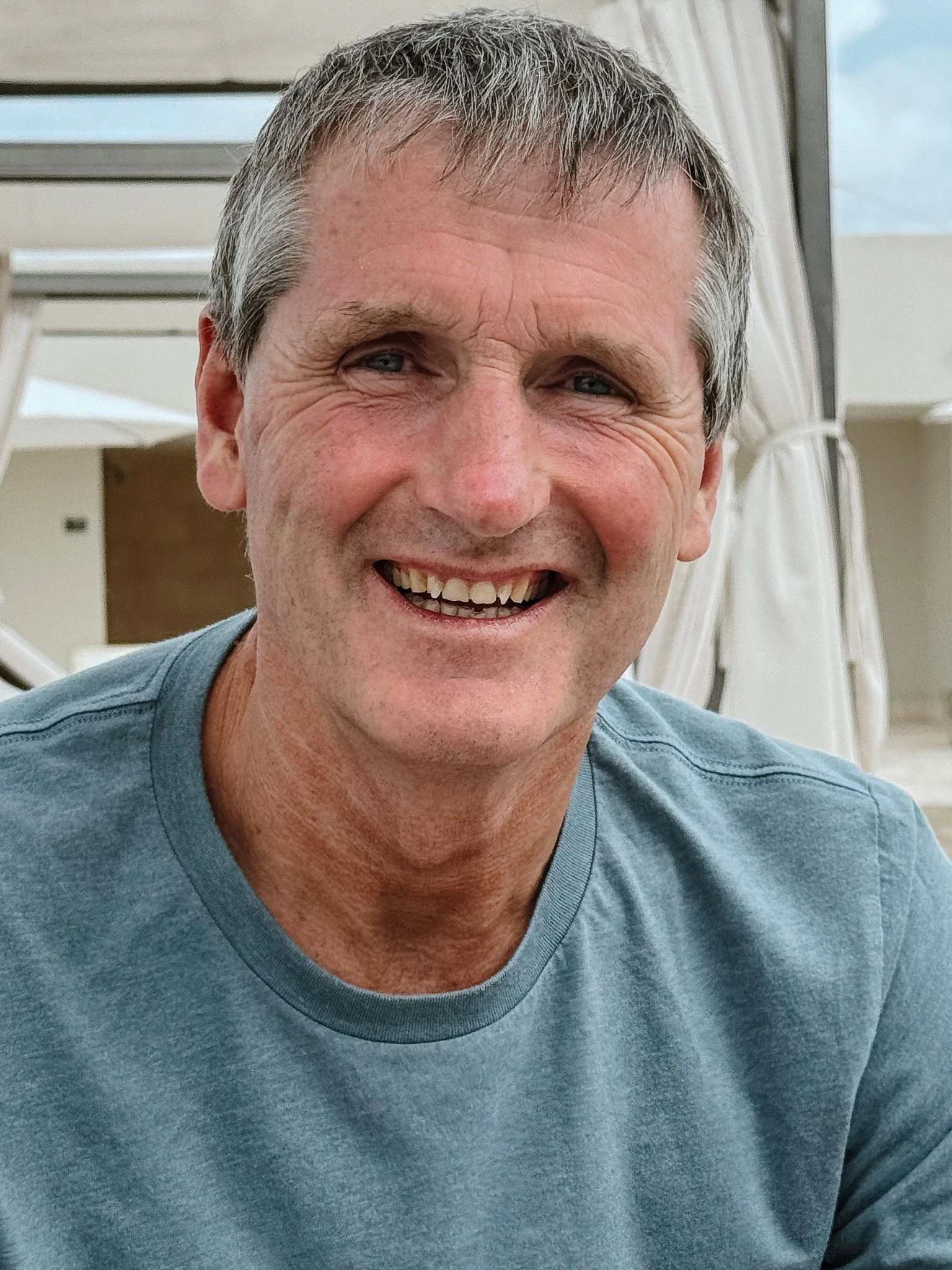 Close-up photo of a smiling Bruce Walker, founder of Creston Electric LTD.