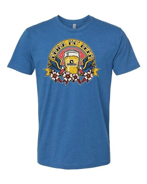 bright blue tee featuring drink mo beer graphic drawn in traditional american tattoo style