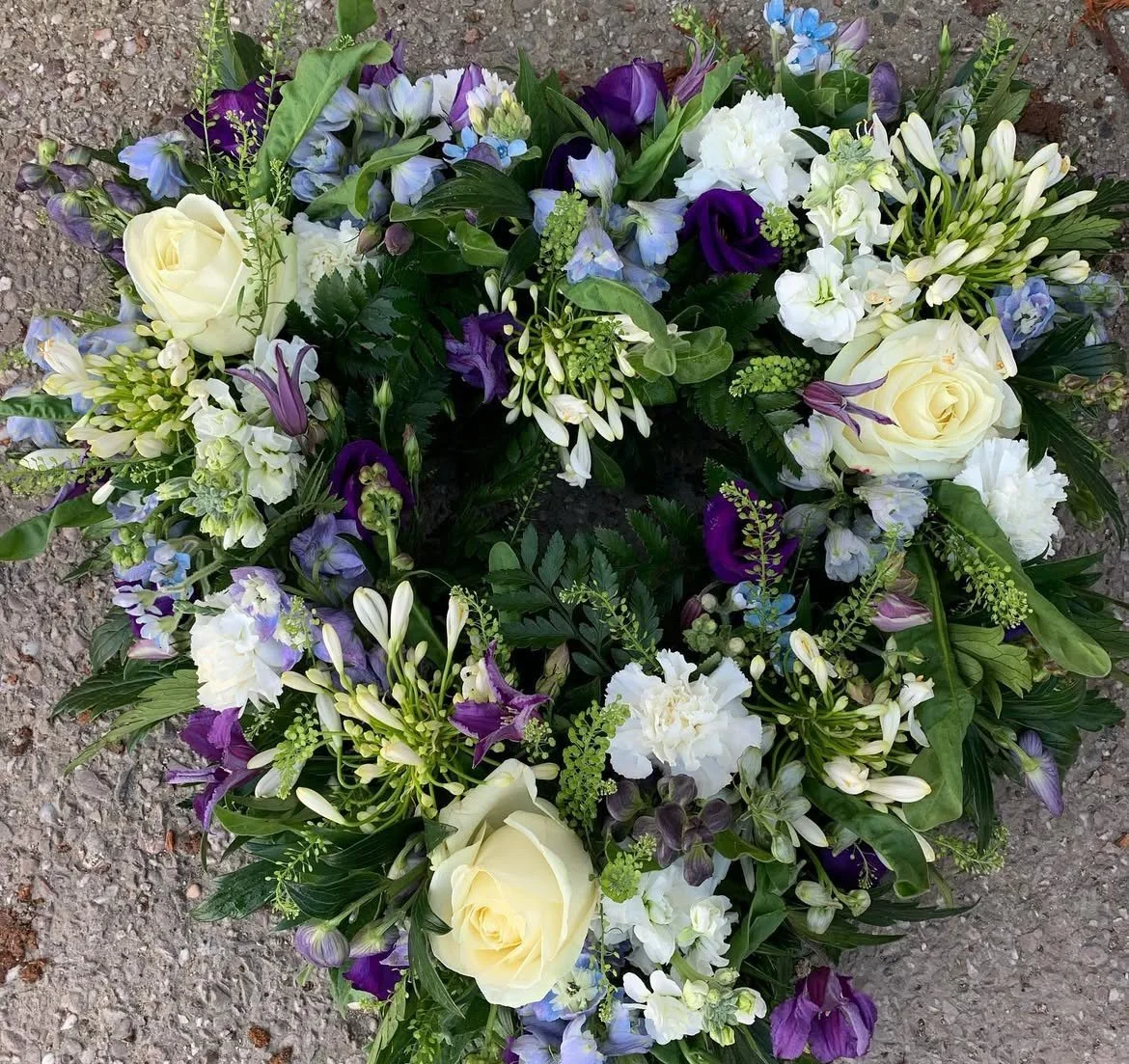 Wigan sustainable funeral florist blue and white funeral flowers in heart shape