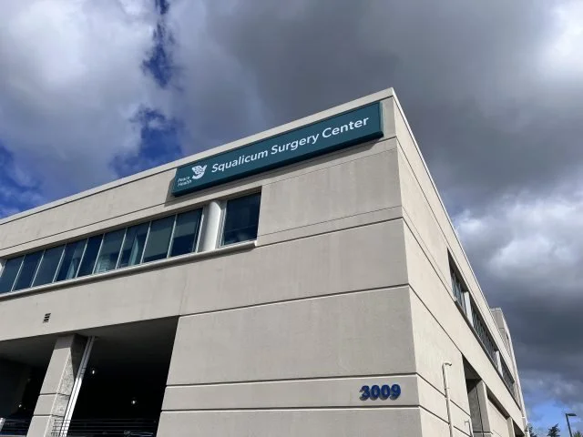 Exterior of a medical building labeled Squalicum Surgery Center with the street number 3009.