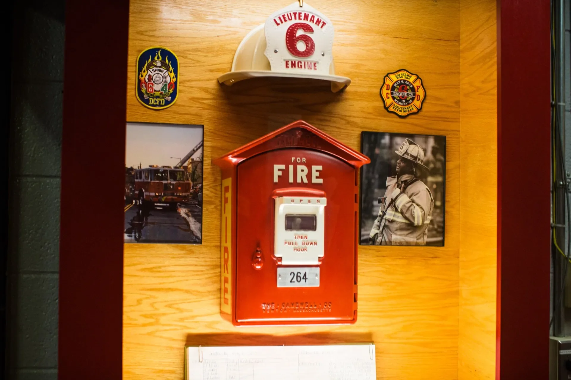 A memorial box honoring Lt. Kevin McRae sits in the watch room at 6 Engine firehouse in New Jersey Ave, NW. Photograph by Erica Baker