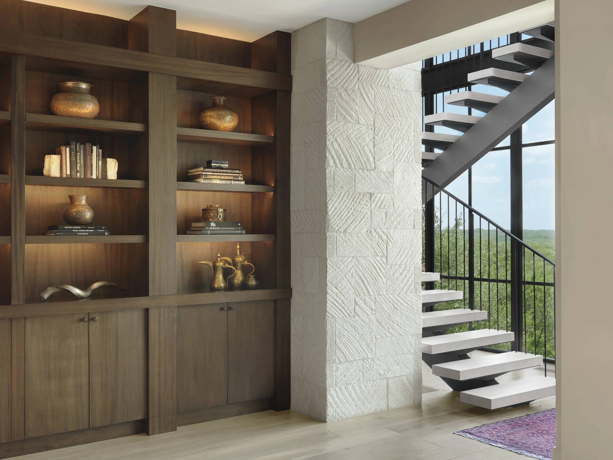 downstairs bookcases and stair.jpg
