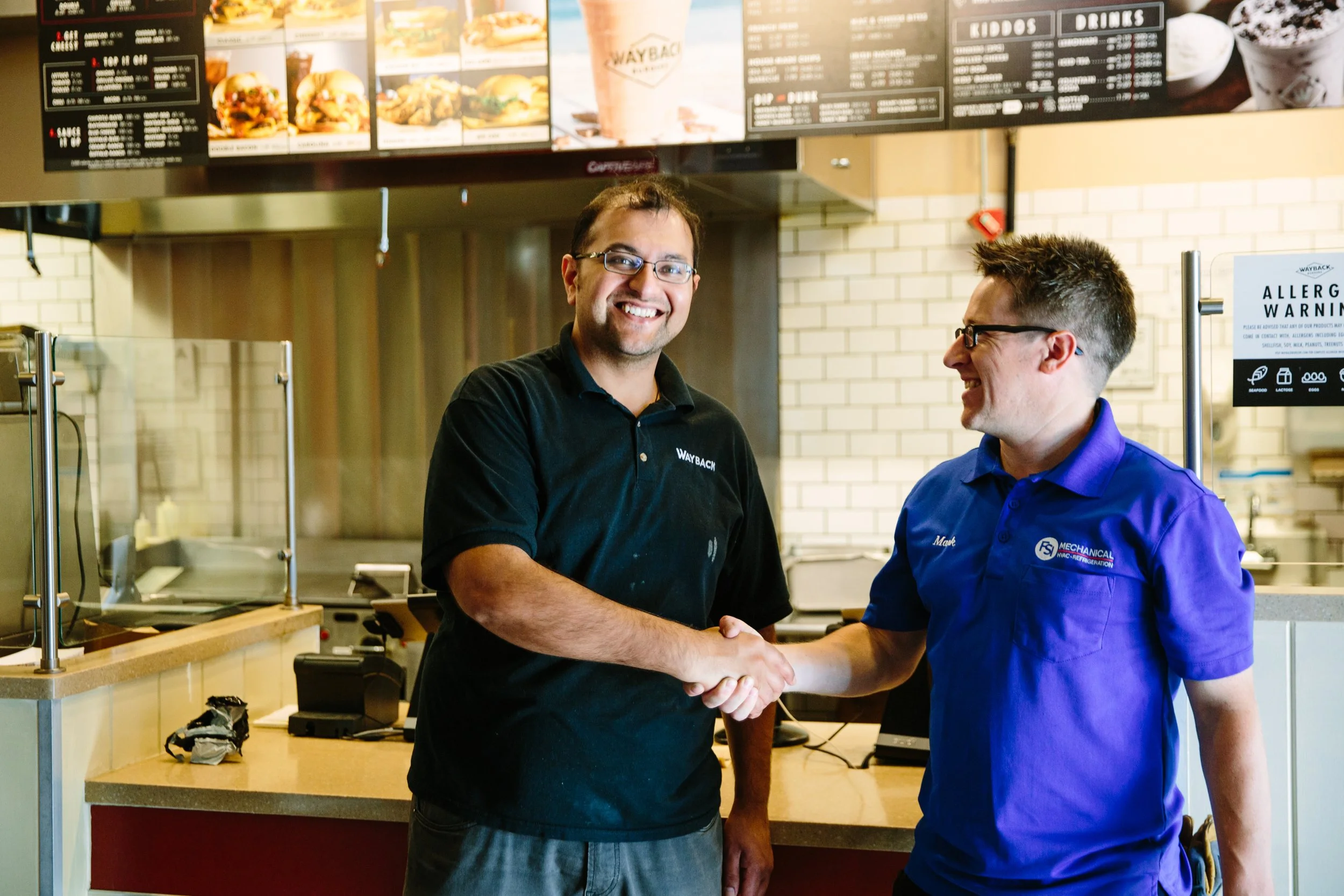 Mark McNally with a happy customer