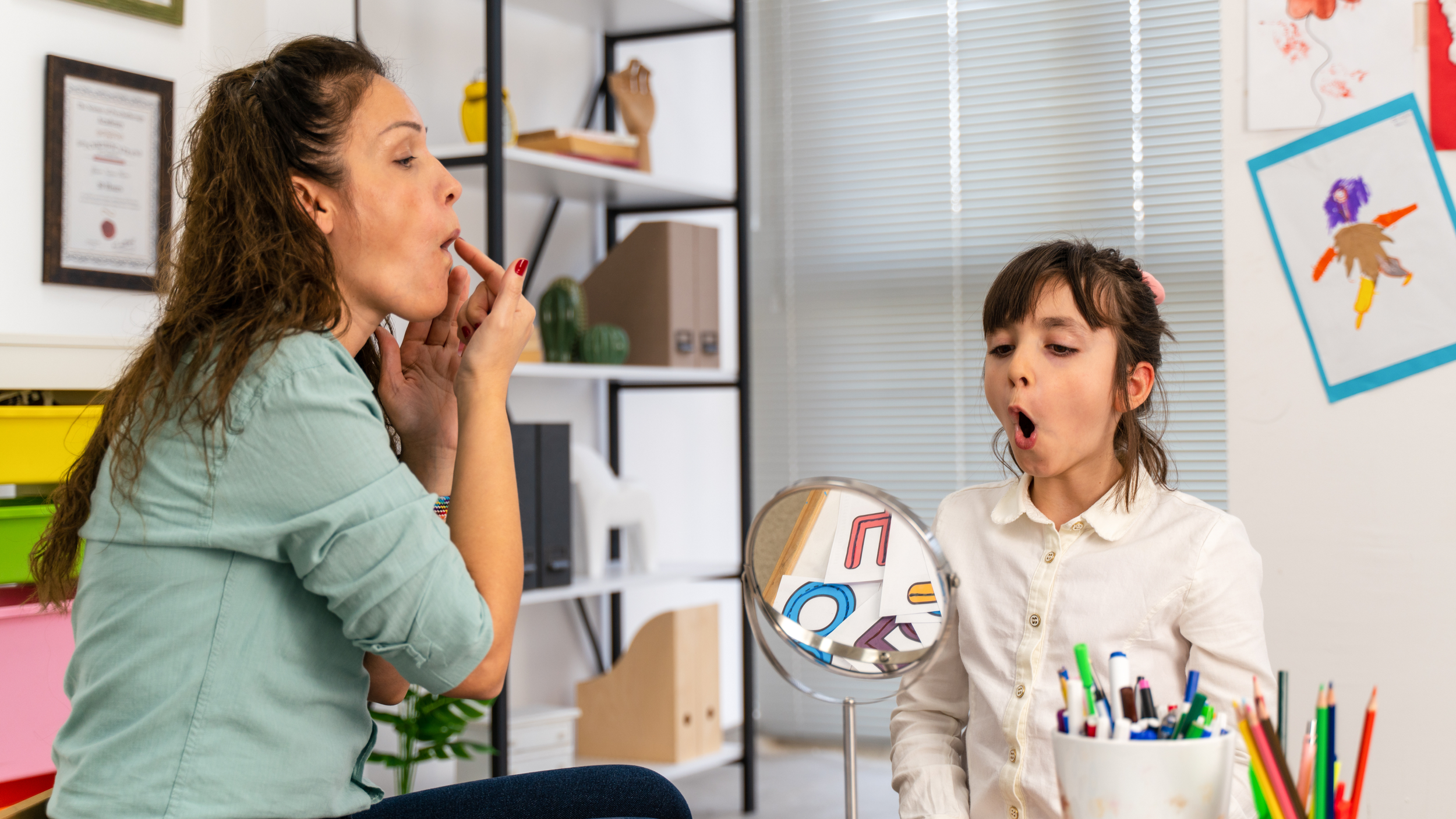 SLP doing articulation therapy with The Next Page Speech Therapy in Jacksonville, Florida