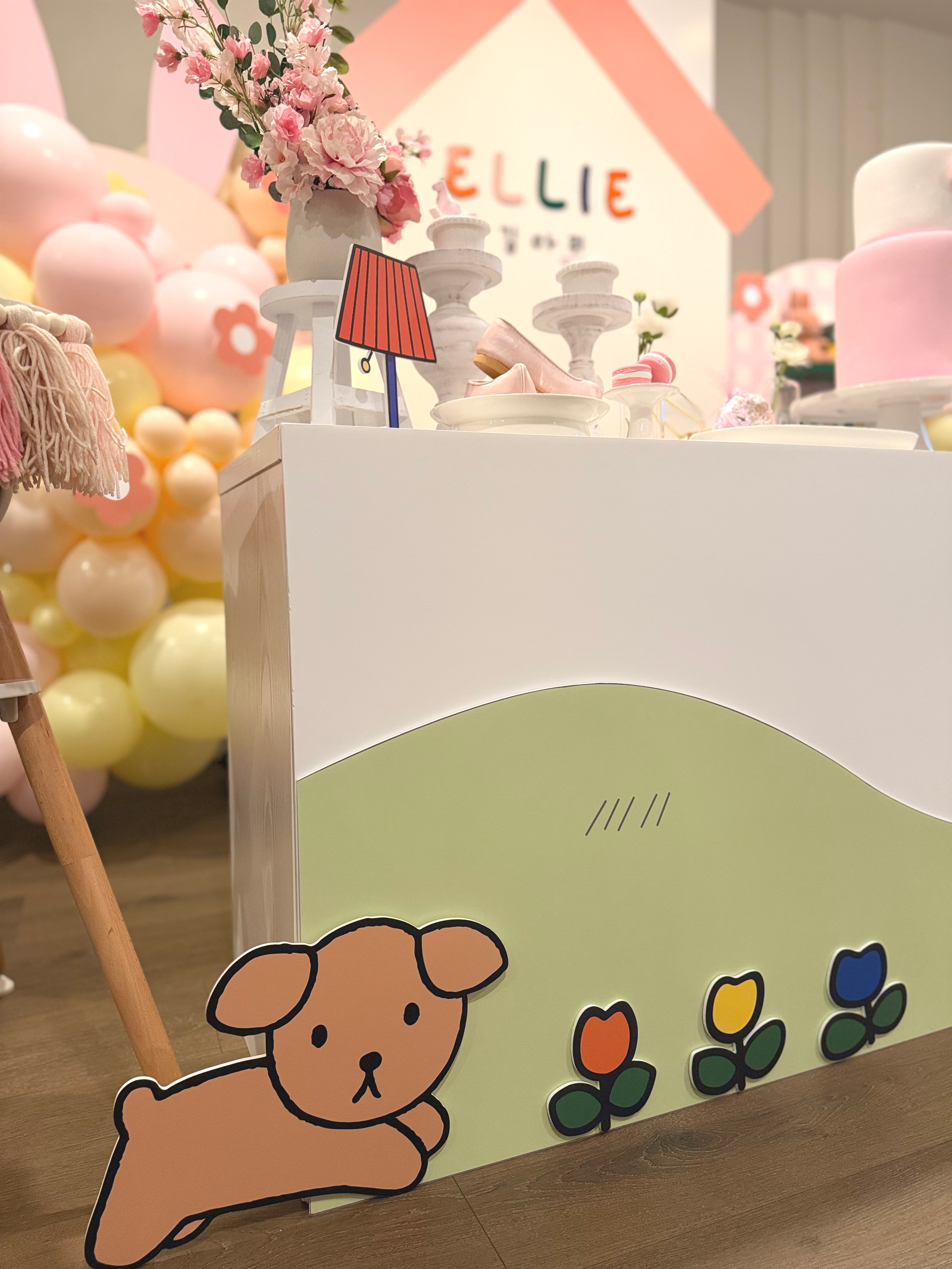 Custom Miffy themed birthday decor with dol / dohl table styling and balloon setup in Los Angeles.