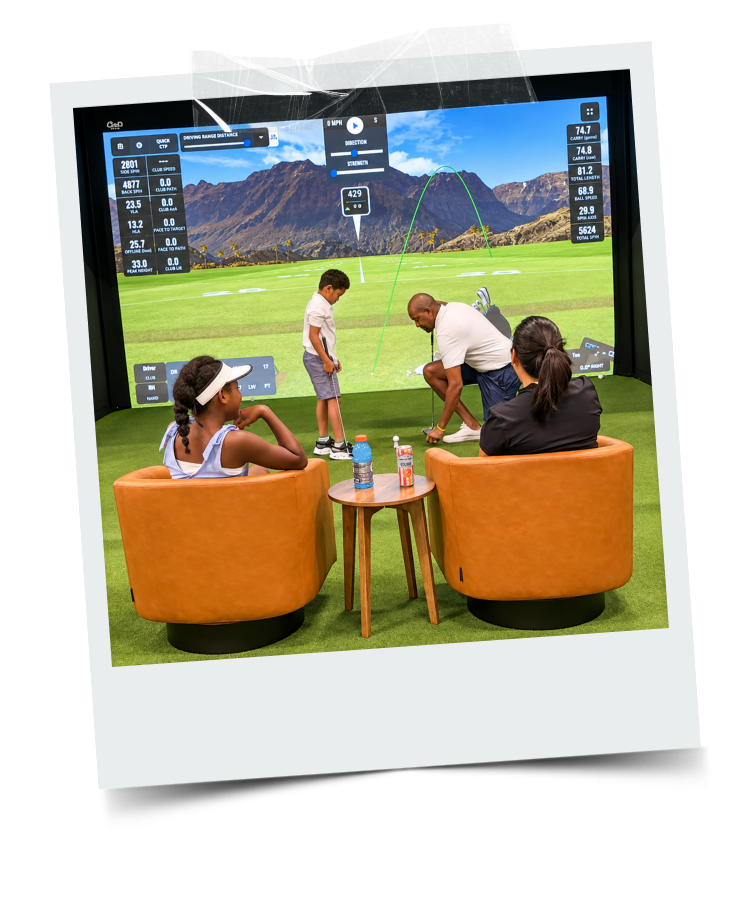 Family playing indoor golf at Riptide Golf & Rec