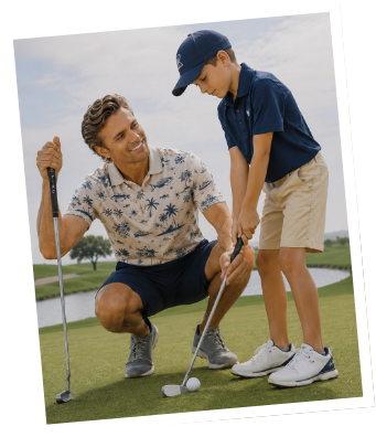 Coach with golfing student at outdoor golfing range.