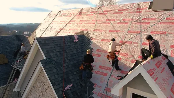 smith-roofing-team-replacing-shingles-on-a-roof-in-west-knoxville.webp