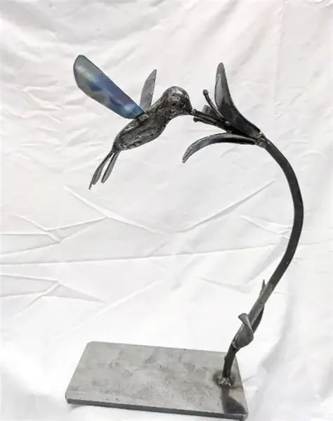 Humming bird and flower custom metal art work