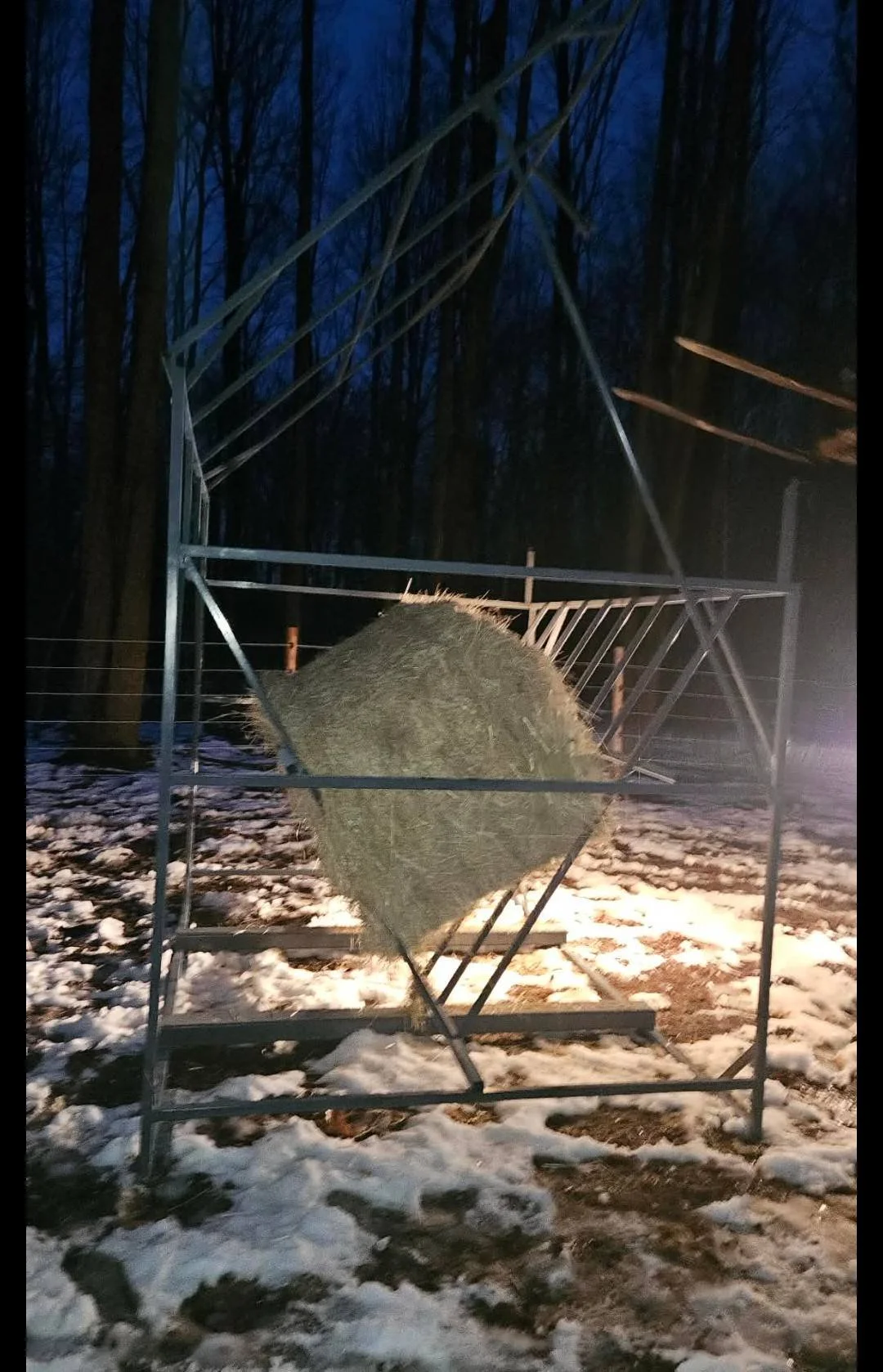 9'L x 6'D x 7.5'T  Cow feeder with hinged roof and support, fork pockets and removable roof. (Loaded with 4' x 4' x8' bale)