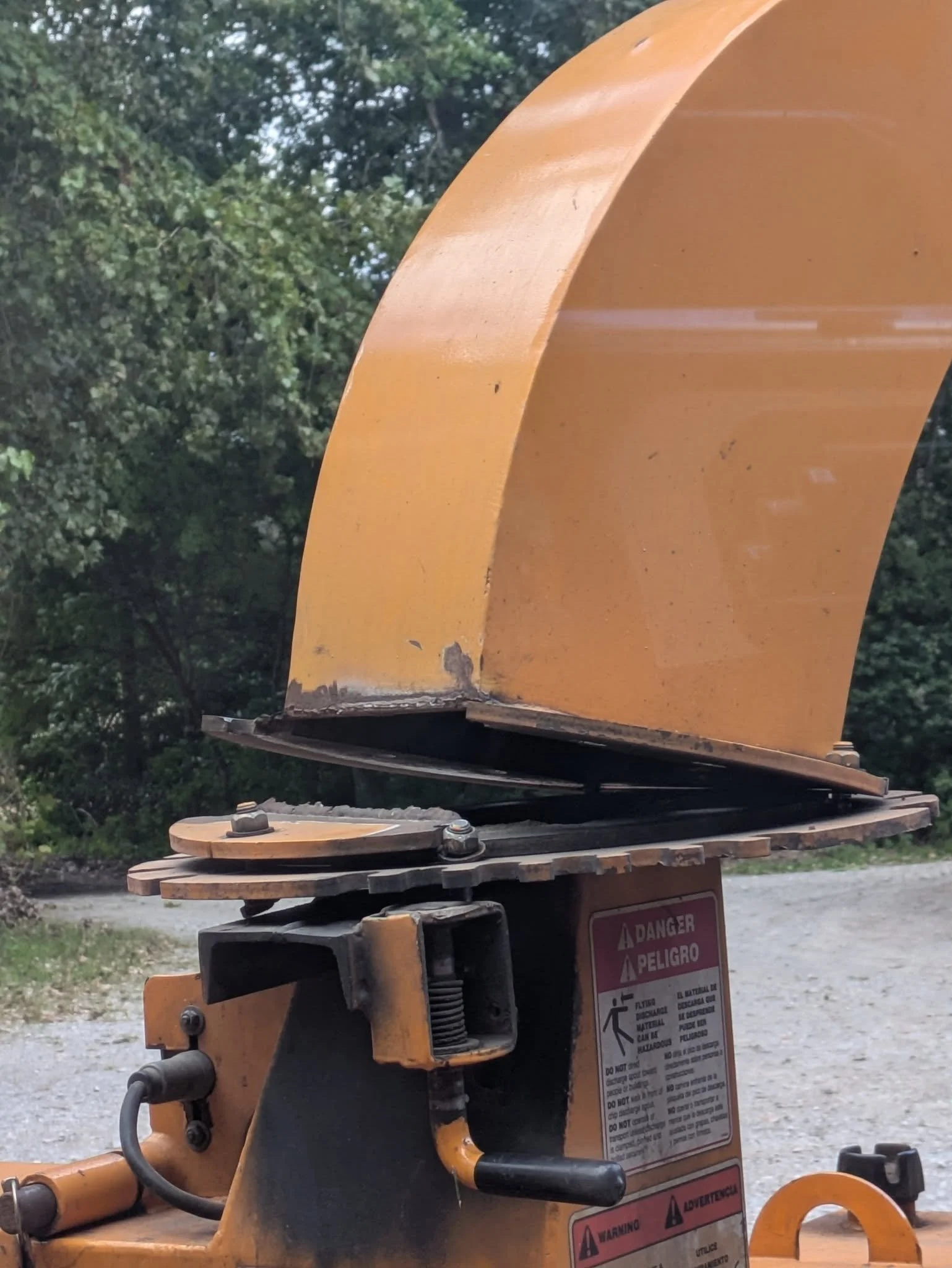 Wood chipper chute broke from flange (see next picture )