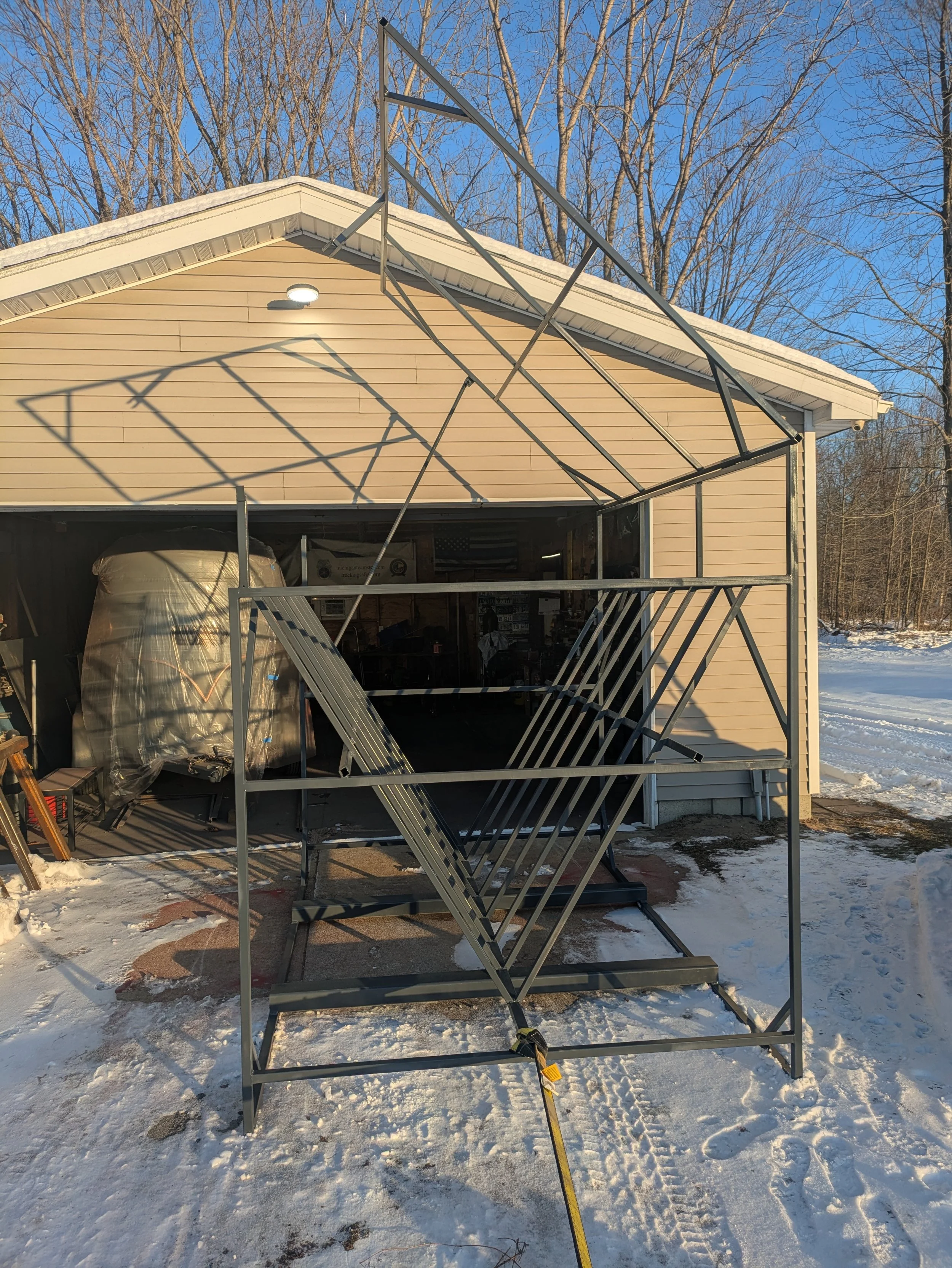 9'L x 6'D x 7.5'T  Cow feeder with hinged roof and support, fork pockets and removable roof
