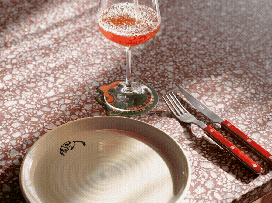 raspberry custom terrazzo table setting in Pixie food and wine private dining room