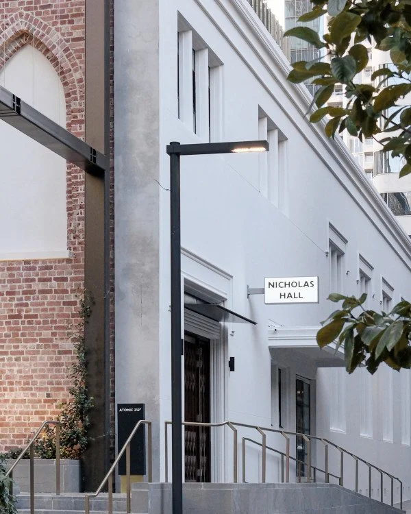 Nicholas hall building front white and signage