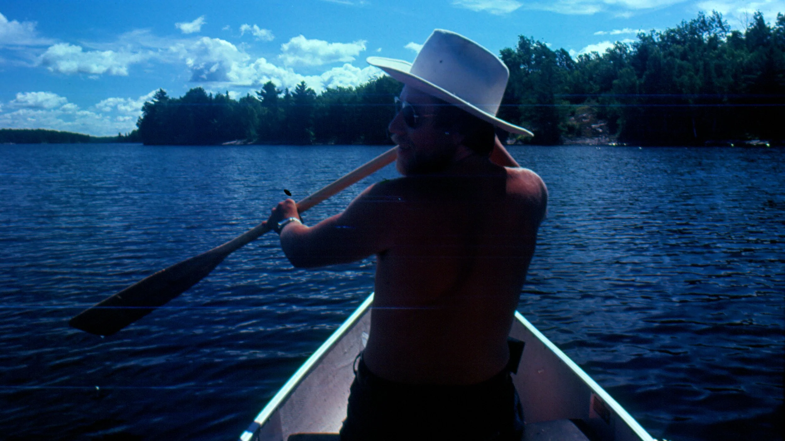 Outdoorsman canoeing Ontario
