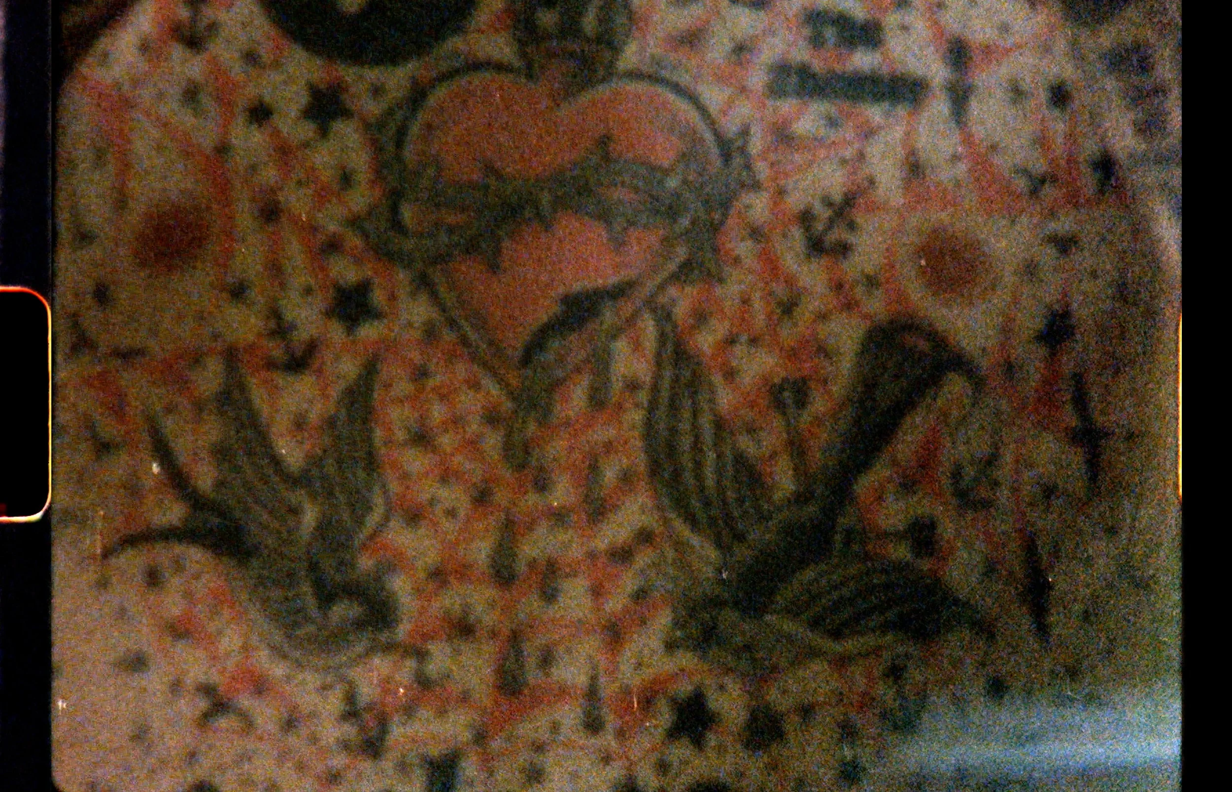 Chest tattoos sacred heart Reggie Grey 8mm film