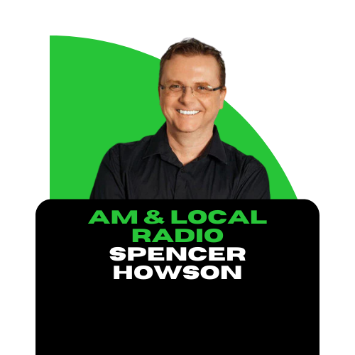 Portrait of Spencer Howson smiling, wearing glasses and a black shirt, in front of a background with green and blue geometric shapes, with text 'AM & Local Radio Spencer Howson' in black and green.