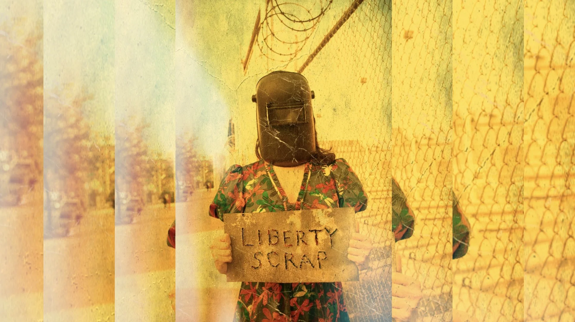 A person wearing a dress, holding a sign that reads 'LIBERTY SCRAP' which is the title of a new play by Christina Masciotti, directed and designed by T. Ryder Smith at Culture Lab LIC in March 2026. World Premiere.