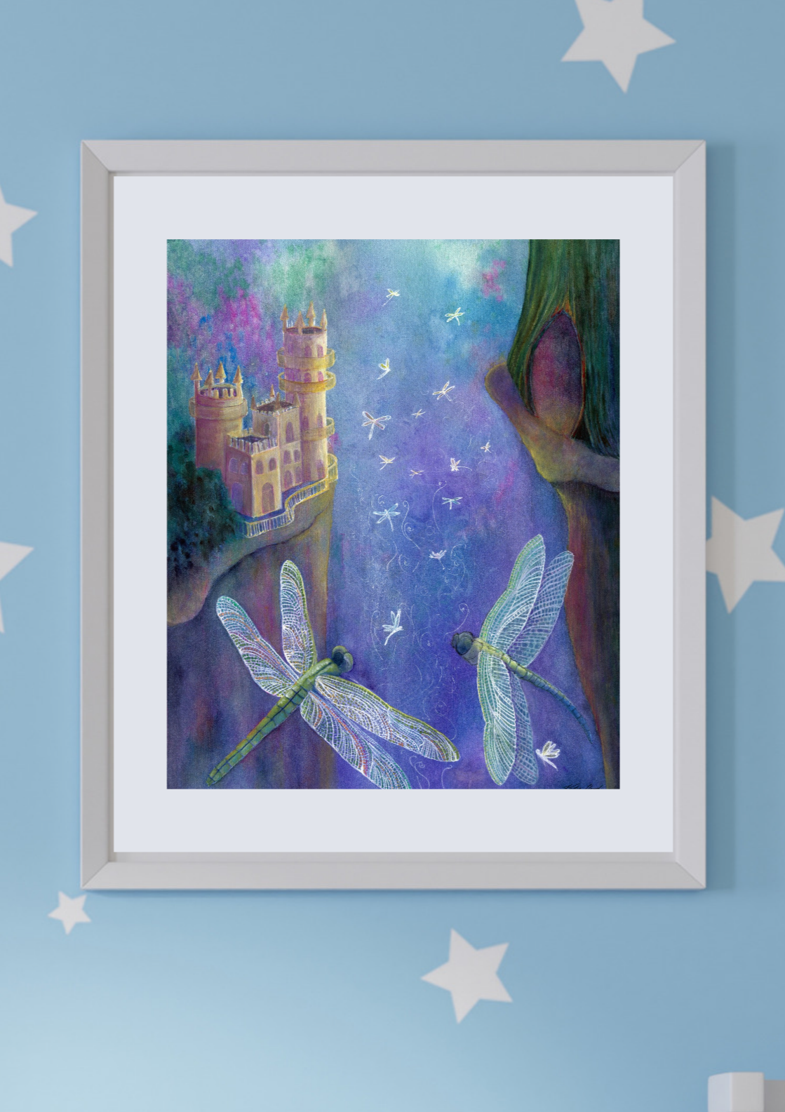 Dragonfly Cavern fantasy art print in a silver frame on a pale blue starry wall