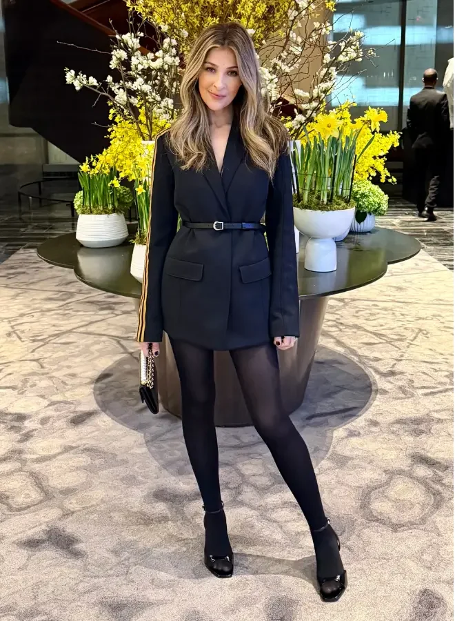 Polished black blazer style.