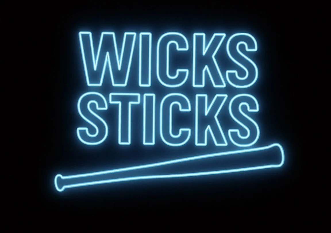 Neon sign reading "Wicks Sticks" with an illustration of a lit matchstick underneath.