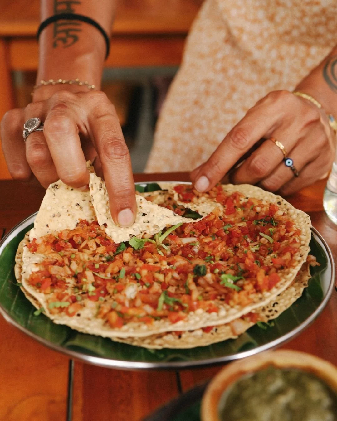 Masala Papad is spicy, crunchy, fresh and tangy -- everything required for an awesome perfect starter or snack ✅✅✅

#balieats #indianfoodbali #balifood #VeganIndianFood #balidining #balifoodies #UluwatuFood