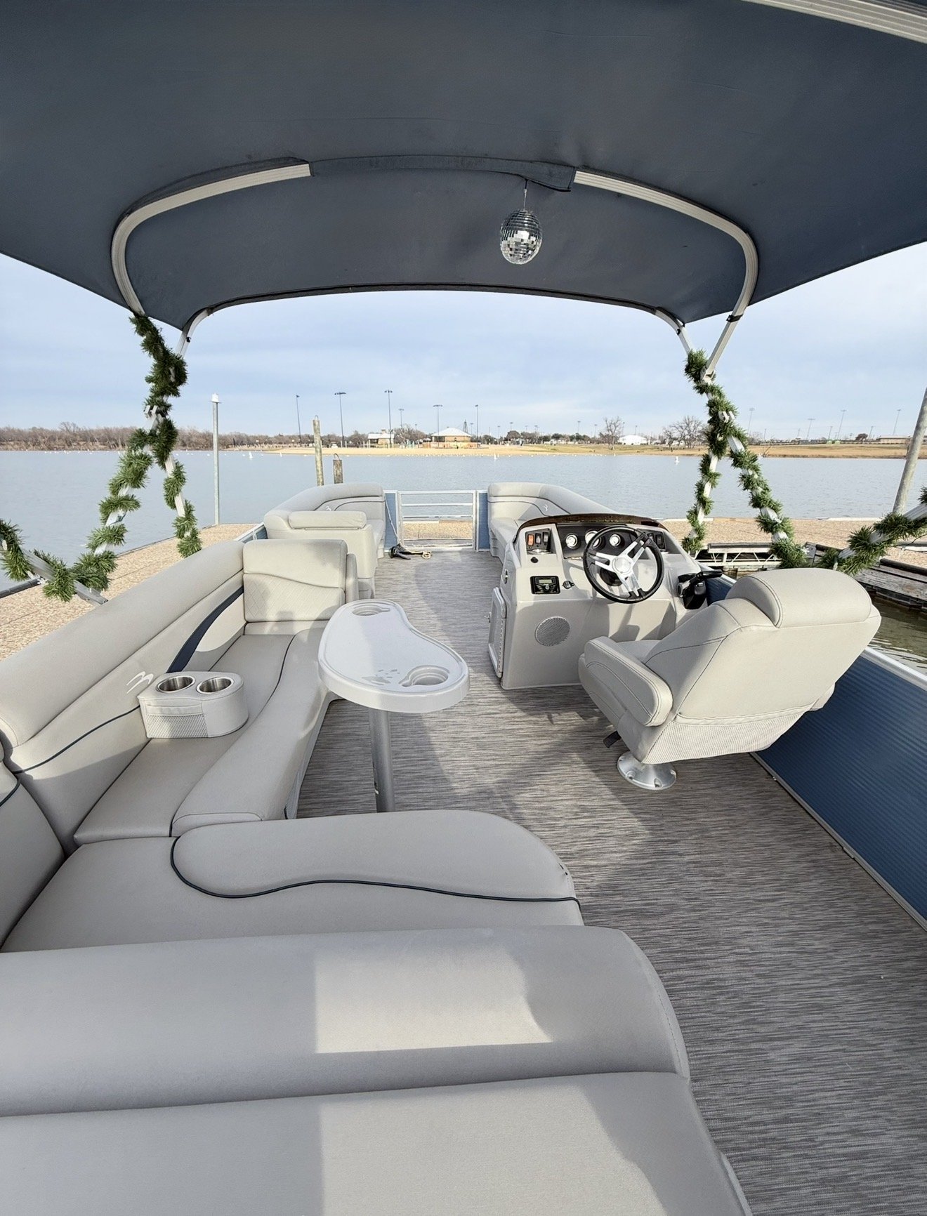 Interior view showing spacious seating on BoatByVal pontoon at Lake Lewisville