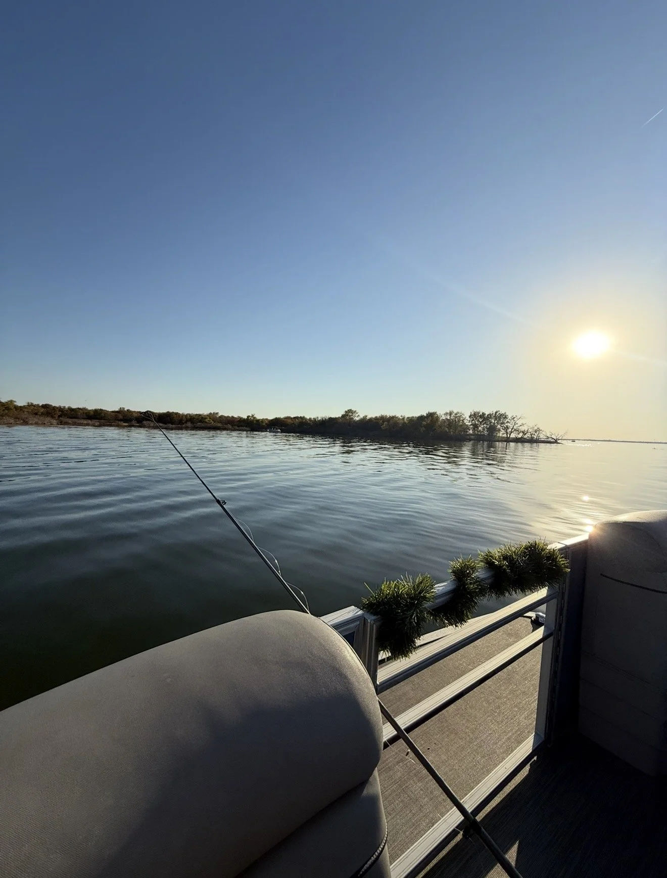 Golden hour cruise on Lake Lewisville aboard a BoatByVal pontoon