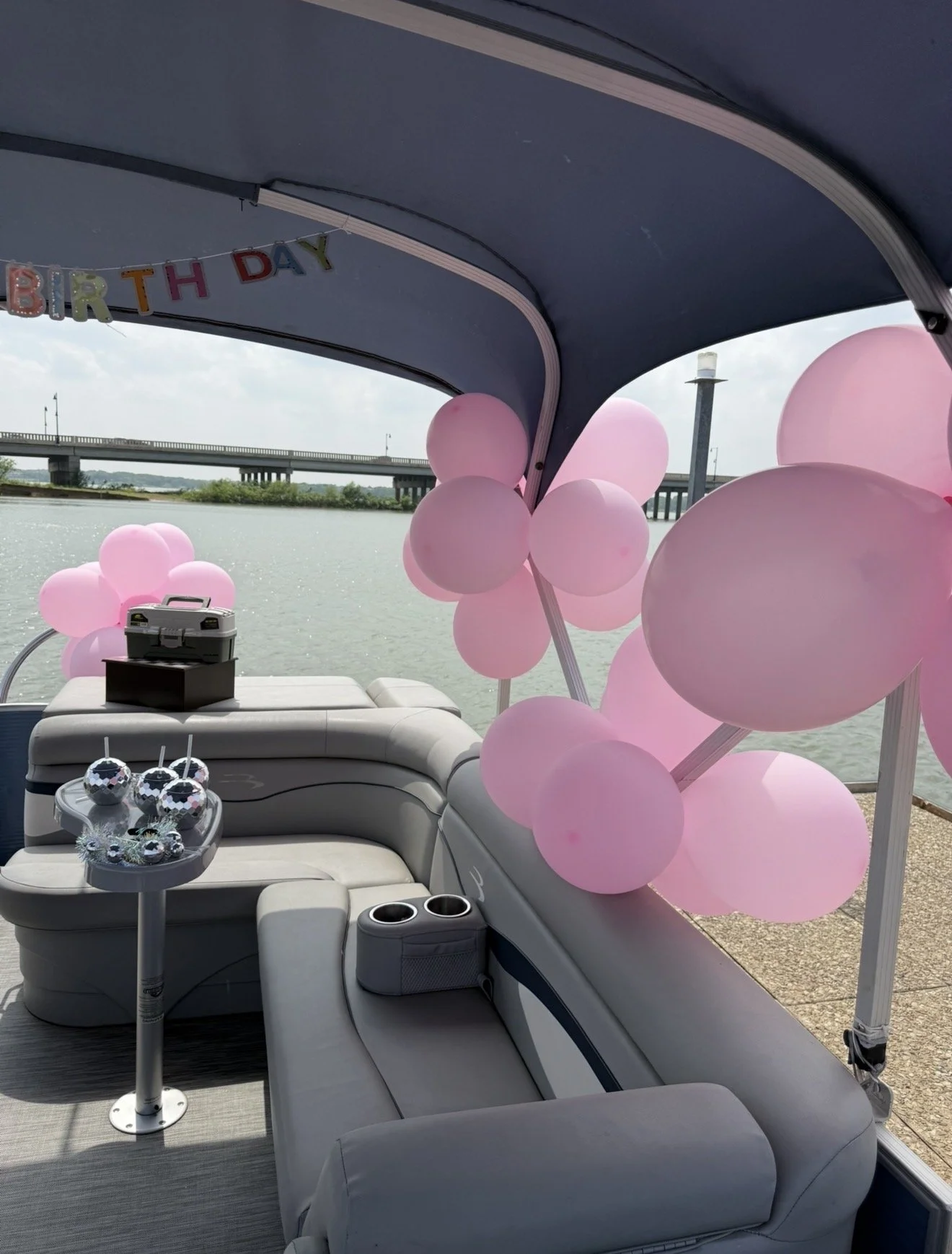 Bachelorette party pontoon rental with themed decorations and party setup on Lake Lewisville.