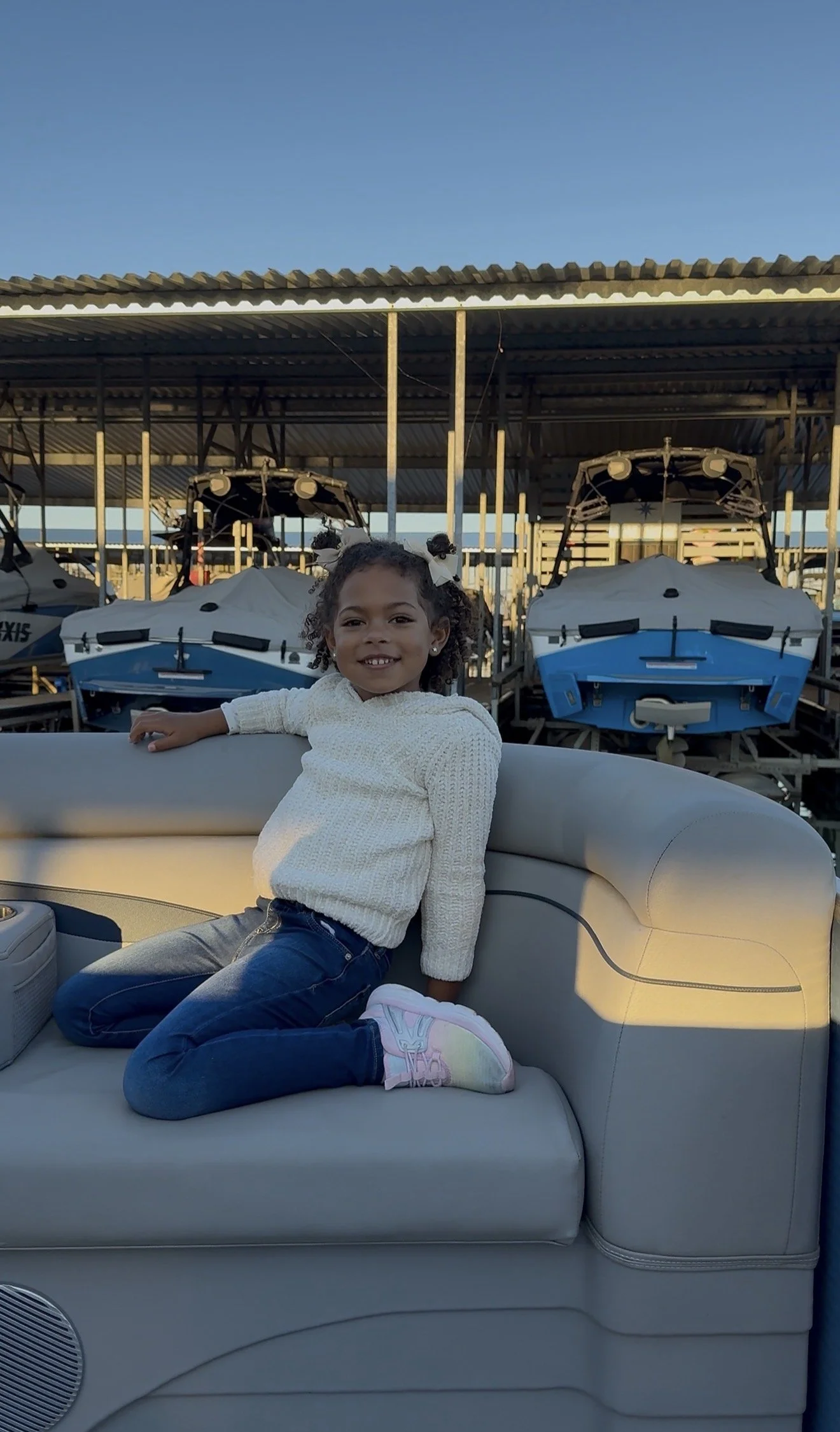 Kids and adults relaxing together on a BoatByVal pontoon boat near Little Elm on Lake Lewisville