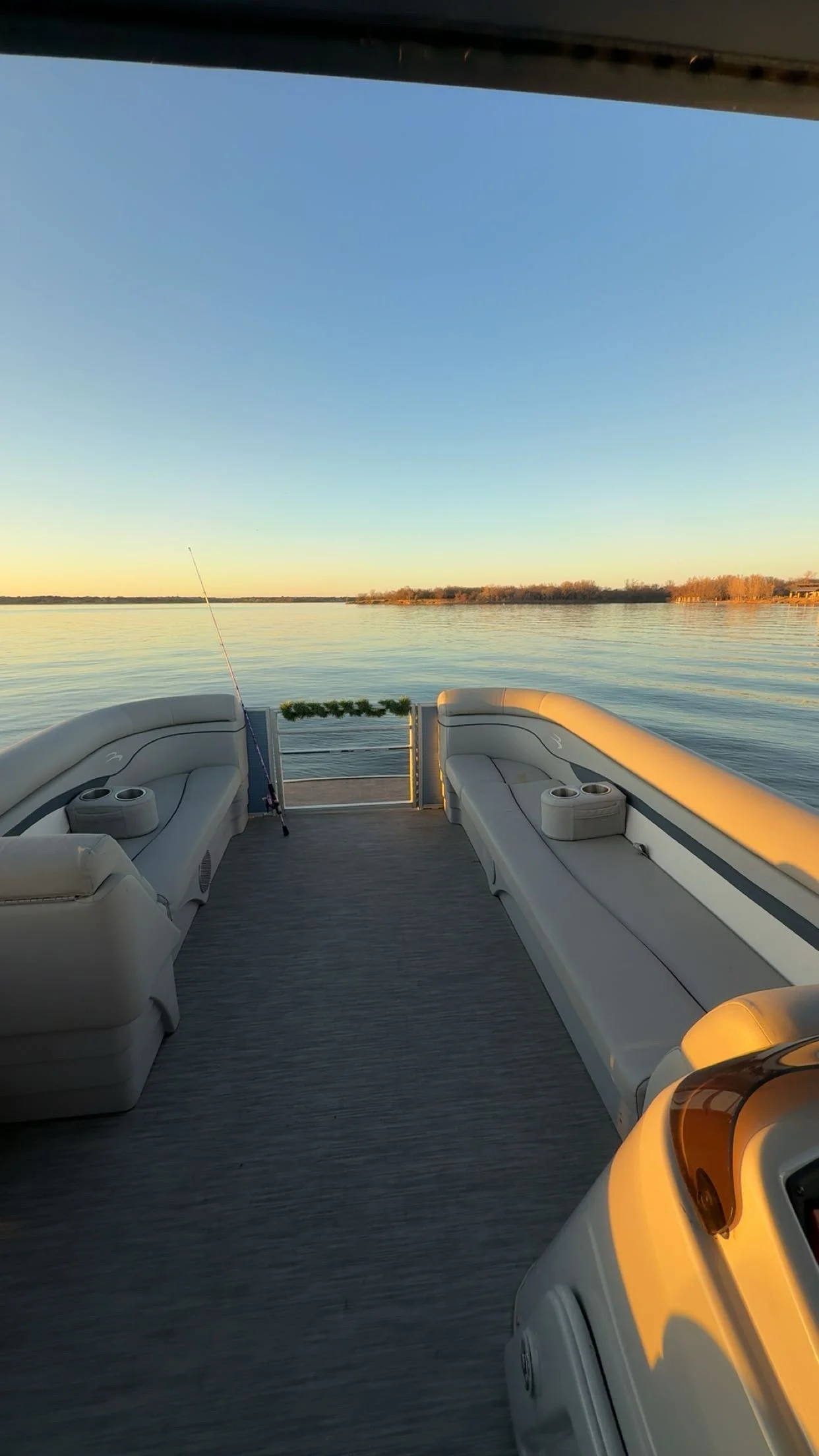 Interior seating and open floor space inside BoatByVal pontoon on Lake Lewisville