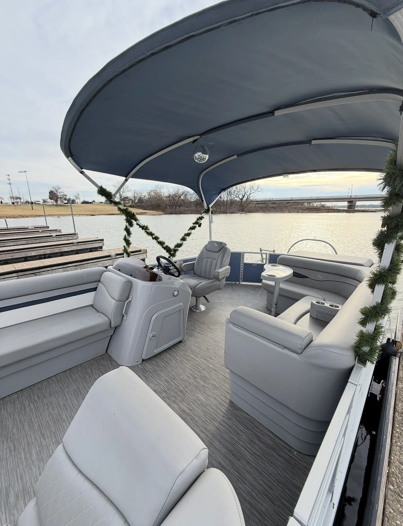 Comfortable interior seating arrangement on BoatByVal pontoon boat