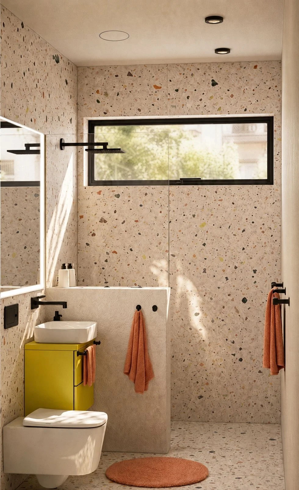 Modernes Badezimmer von modoru mit bunten schadstofffreien und zementfreien Terrazzo-Fliesen, Lehmputz, integriertem Deckenlüfter, Waschtischunterschrank – nachhaltiges Interior Design, ökologische Materialien + gesundes Raumklima