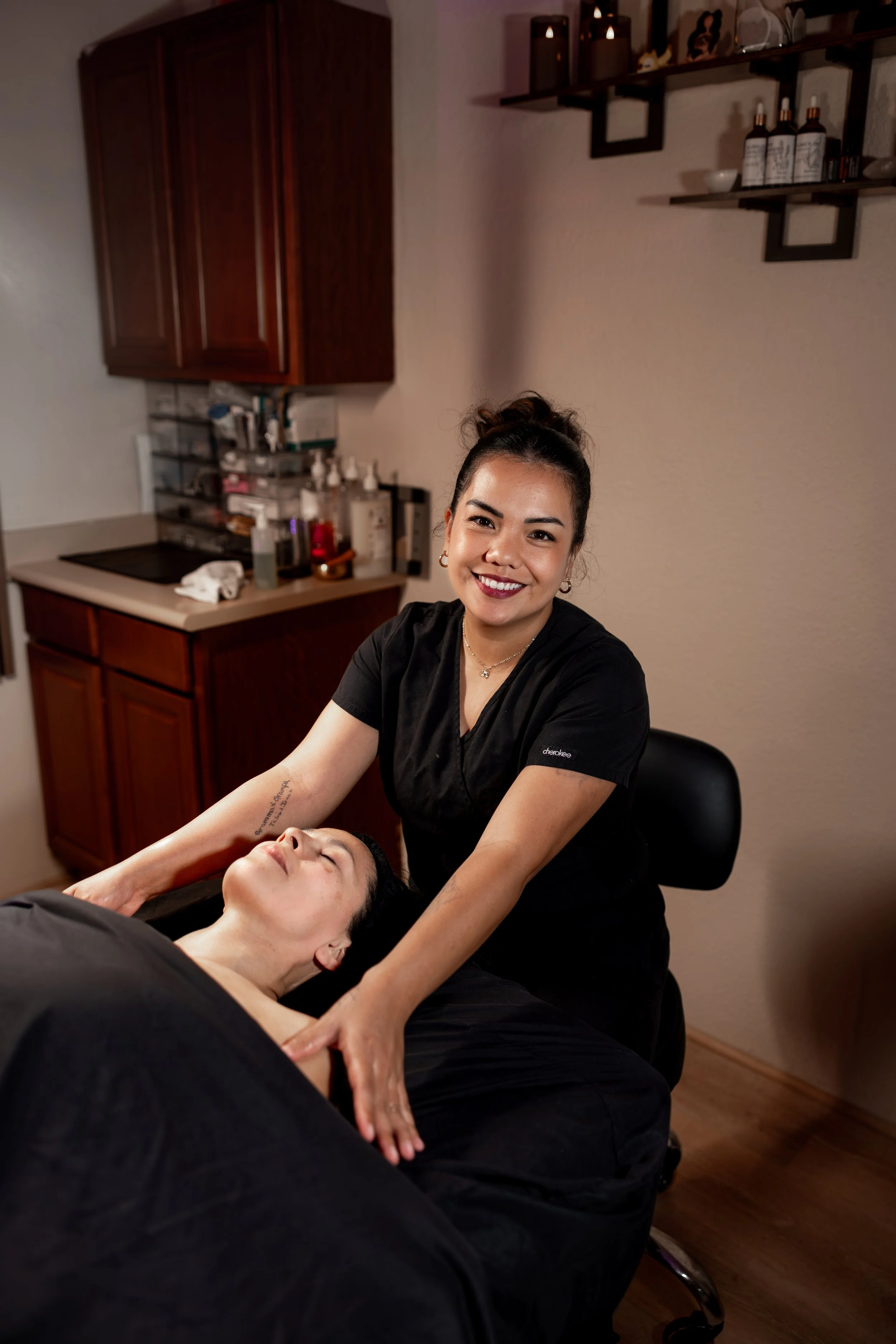 a woman recieves a facial