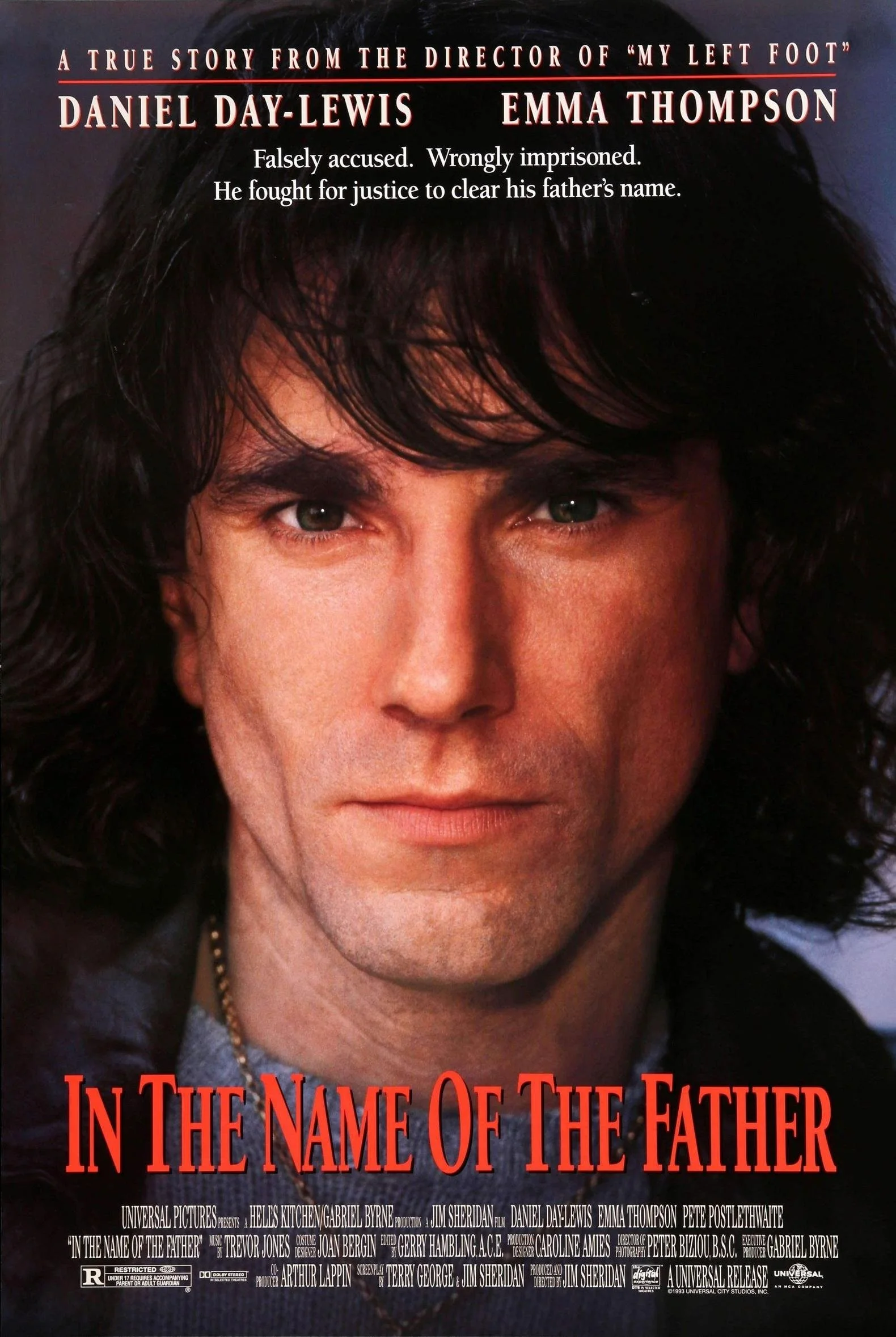 Cover of the movie 'In the Name of the Father' featuring a close-up of a man's face with dark hair and intense eyes, with promotional text at the top and bottom of the poster.