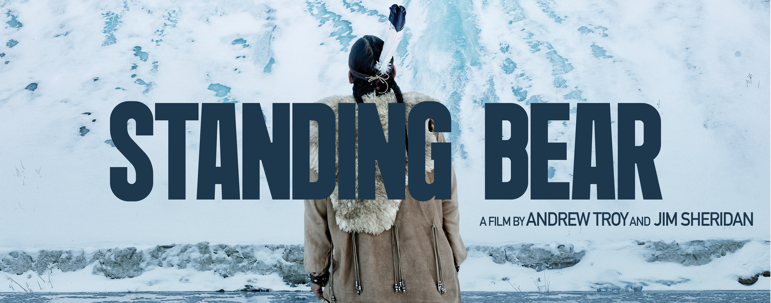 Poster for the epic narrative feature film 'Standing Bear' showing a person wearing traditional Native American clothing, standing in front of a snow-covered landscape with footprints and rocks.