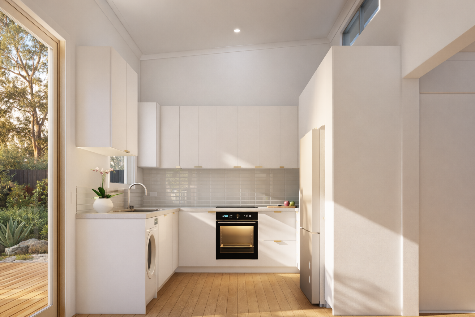 Bright, modern kitchen with white cabinets, a black oven, a white refrigerator, and a window overlooking a garden.