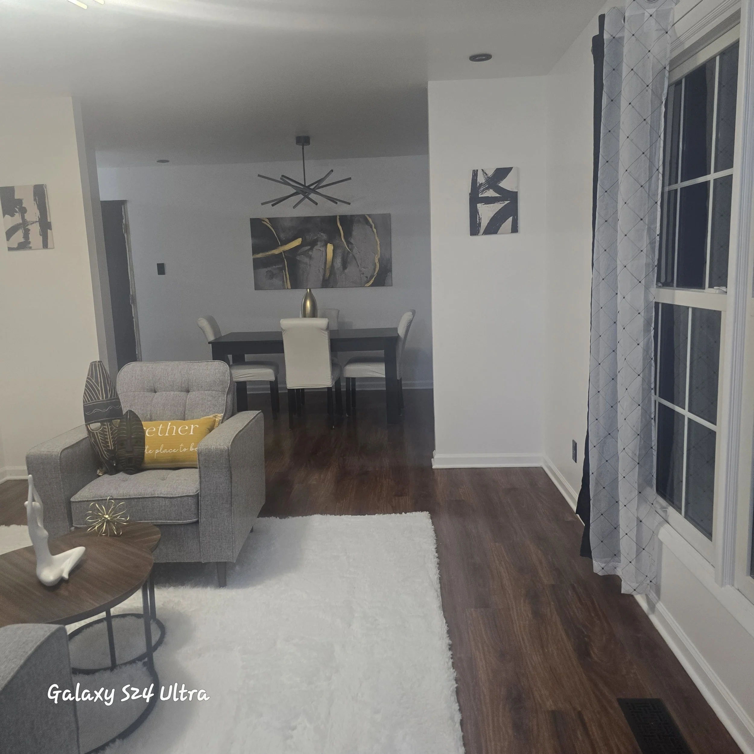 Dark toned vinyl plank flooring throughout a St. Louis home. 