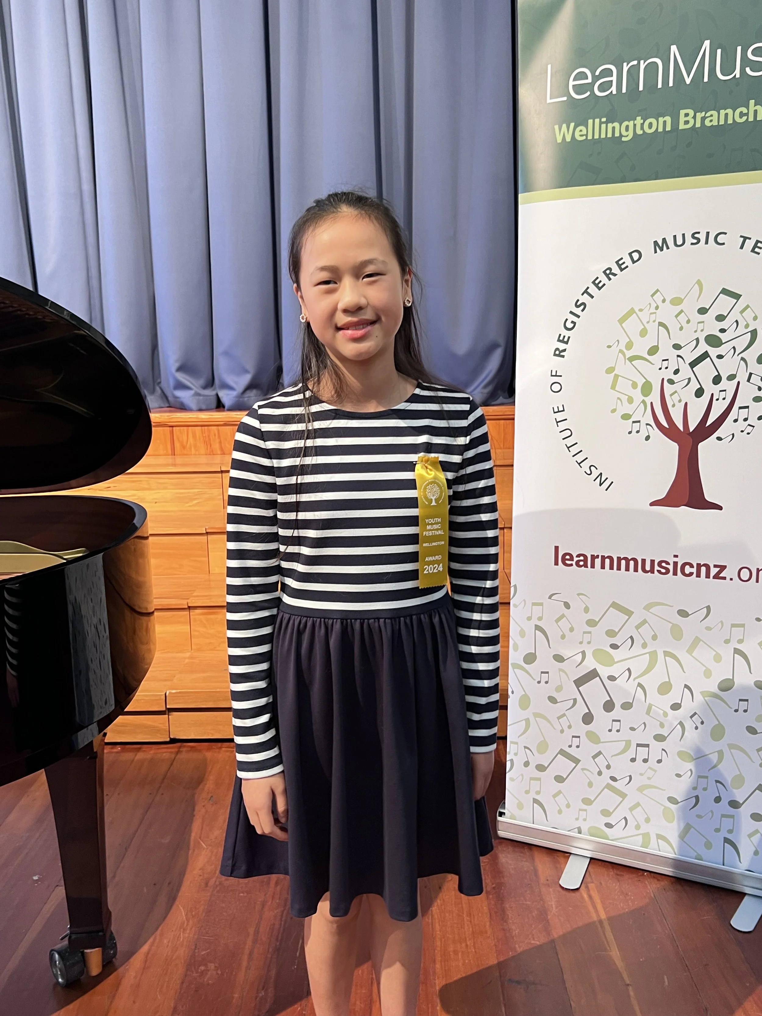 Mietta with Gold Ribbon