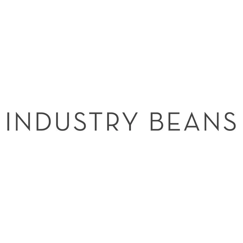 Logo with the words 'INDUSTRY BEANS' in black text on a white background.