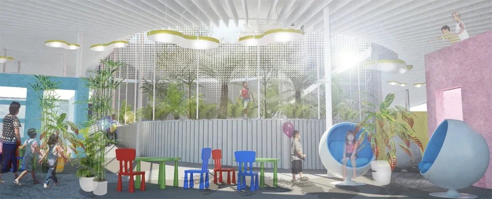 Children playing in an indoor playground with trees, colorful chairs, and modern seating pods.