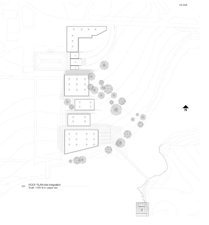 Site plan of a building complex with multiple structures, pathways, trees, and a small separate structure labeled "sauna" in the bottom right corner, oriented with north at the top.