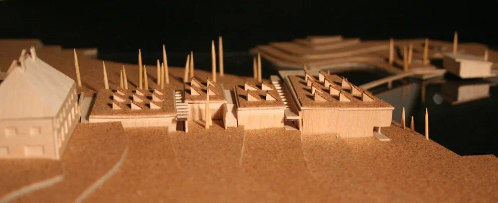 Architectural model of a landscape with buildings and trees.