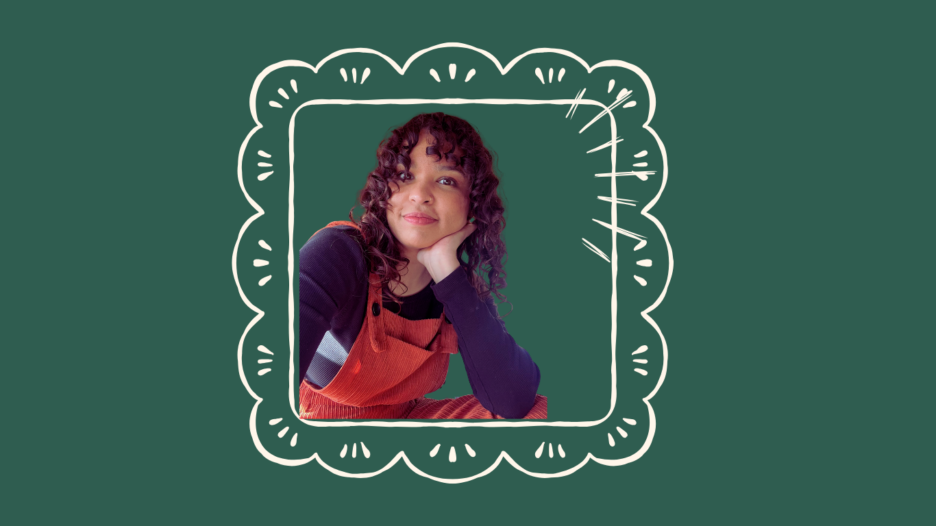 Young woman with curly hair resting her chin on her hand, wearing a dark long-sleeve shirt and an orange apron, against a green background with white decorative border.